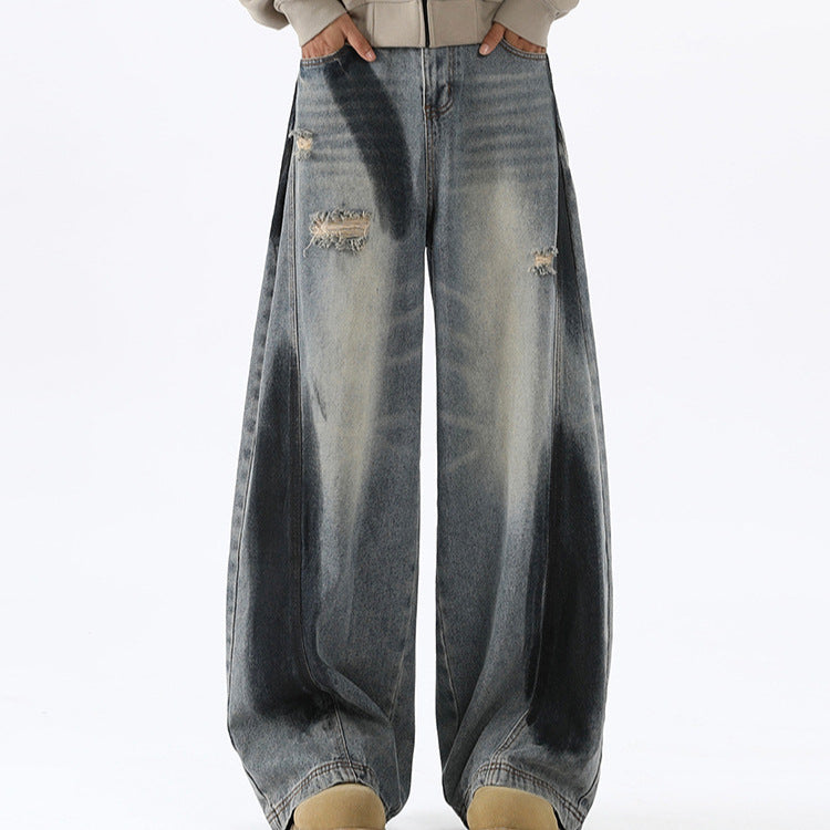 Bending knife deconstruction spray painting to make old jeans