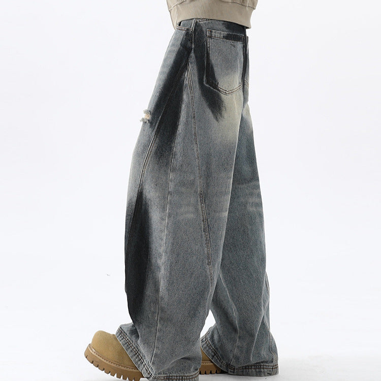 Bending knife deconstruction spray painting to make old jeans