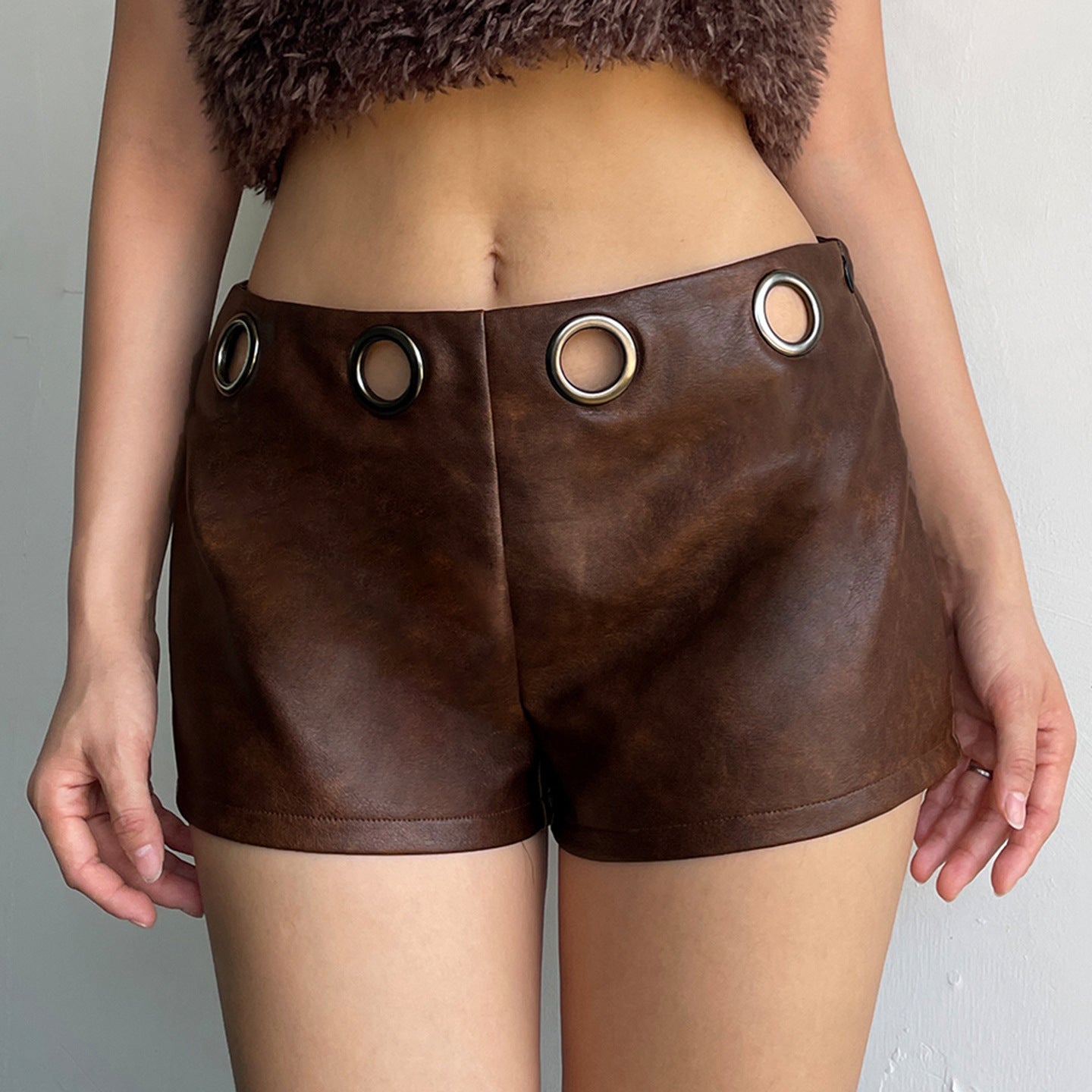 Motorcycle style leather splicing hole waist top spicy girl low waist shorts