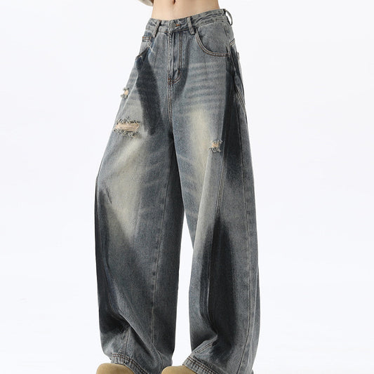 Bending knife deconstruction spray painting to make old jeans
