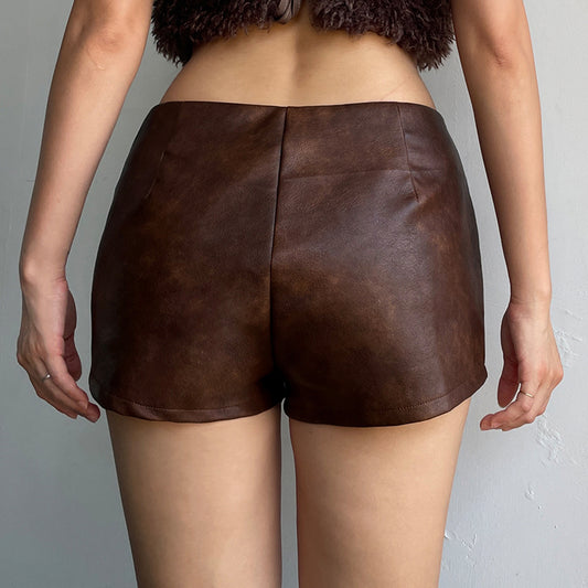 Motorcycle style leather splicing hole waist top spicy girl low waist shorts