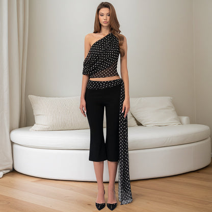 Women's Sleeveless Drop Shoulder Top with Belt and Flared Mid-Length Pants Set