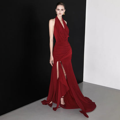 Sexy deep V backless irregular hanging neck sleeveless slim fitting jumpsuit long skirt